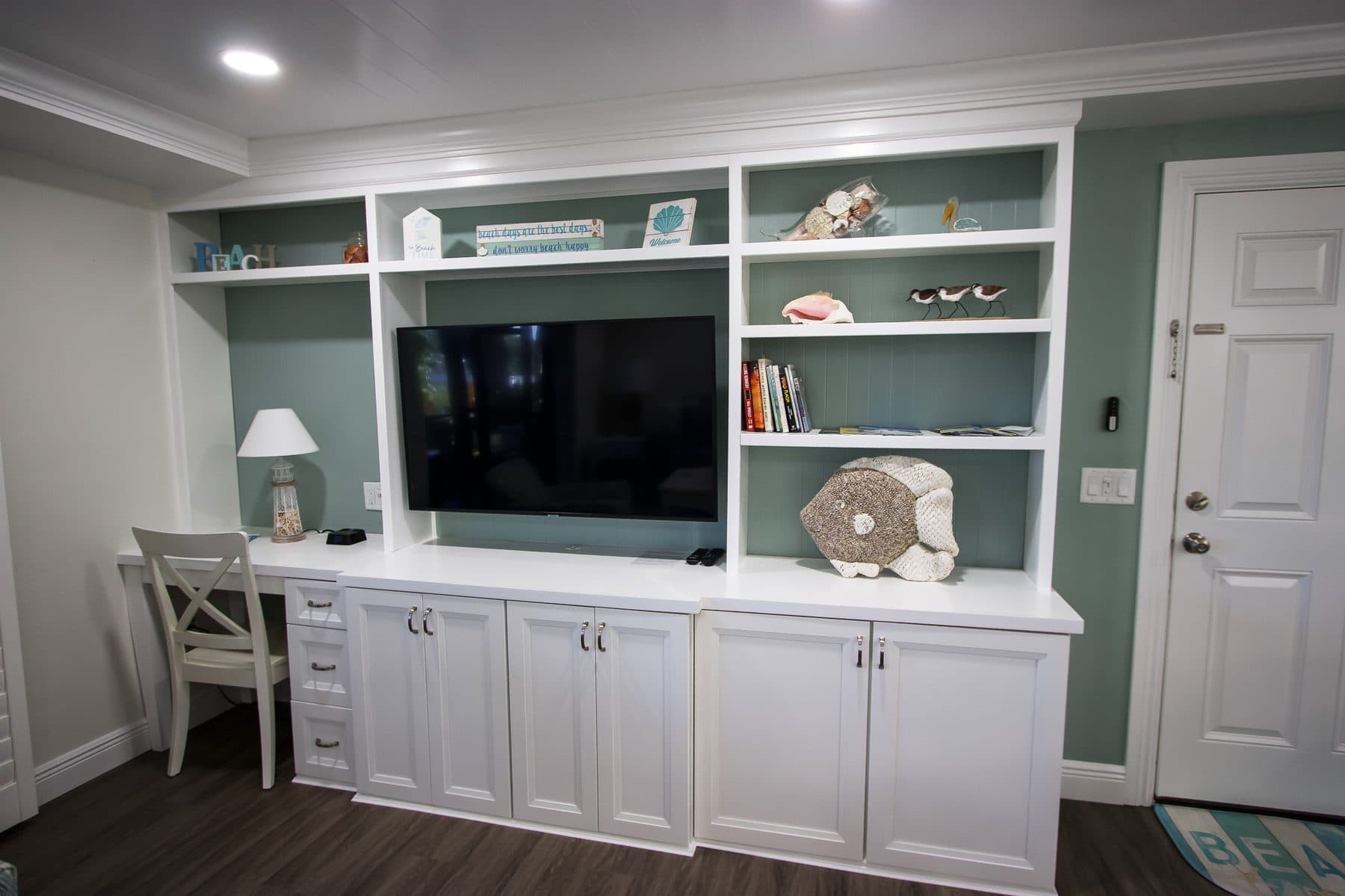 Built-in desk and shelving with accent color