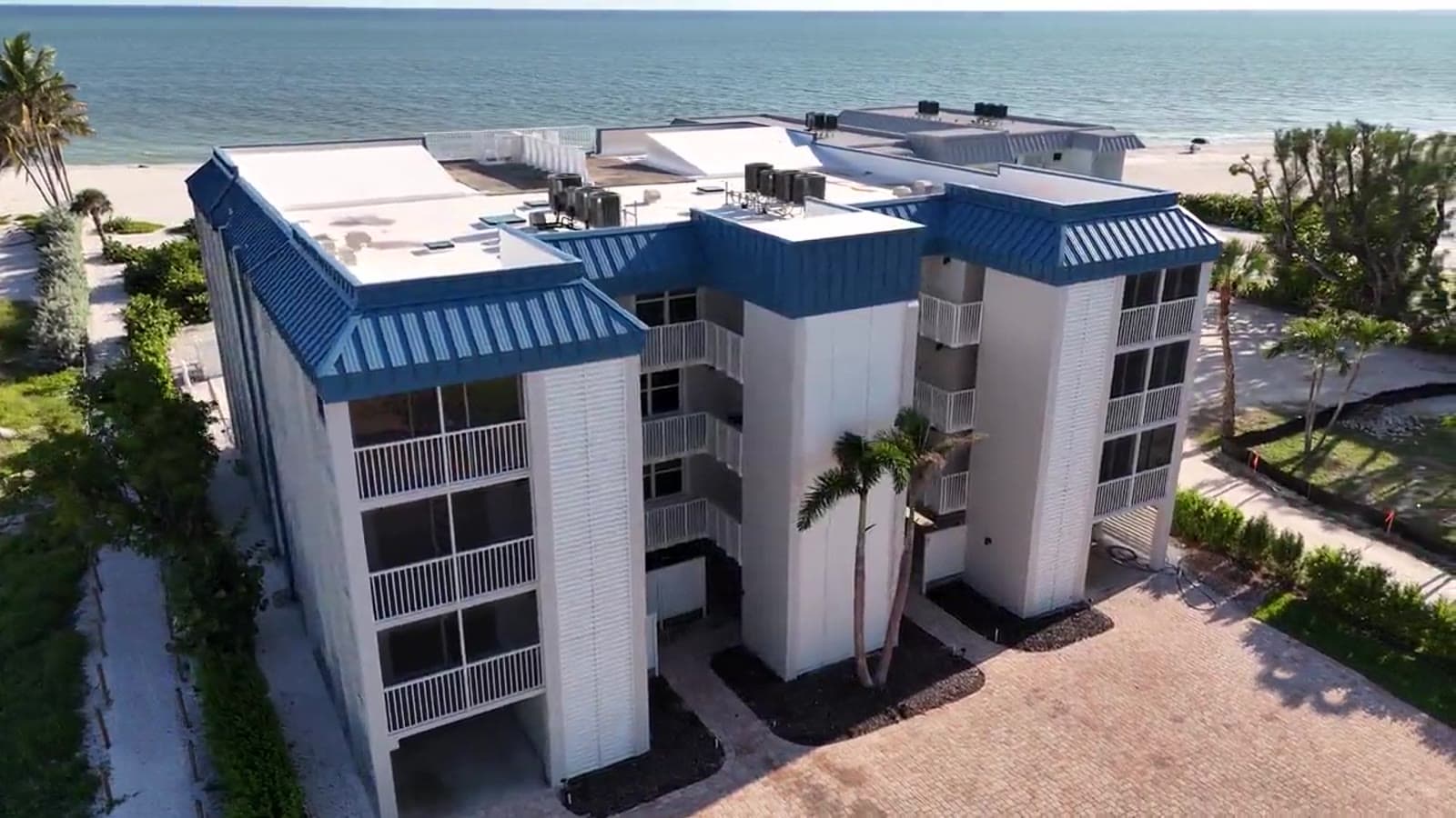 Aerial view of a beachfront condo building